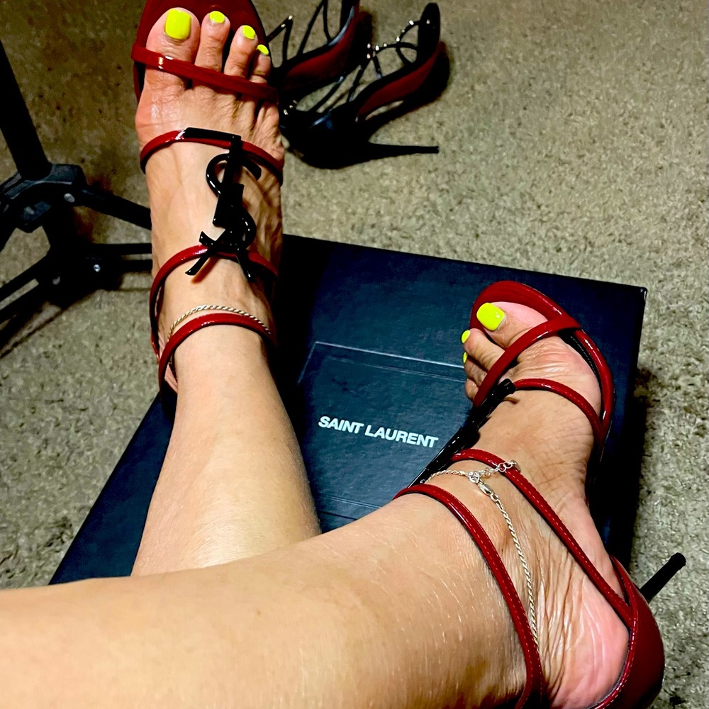 Saint Laurent red size 8.5 4 inch heel height.